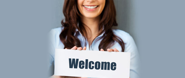 Woman with Welcome Sign