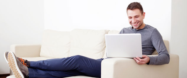 Man Looking at Laptop